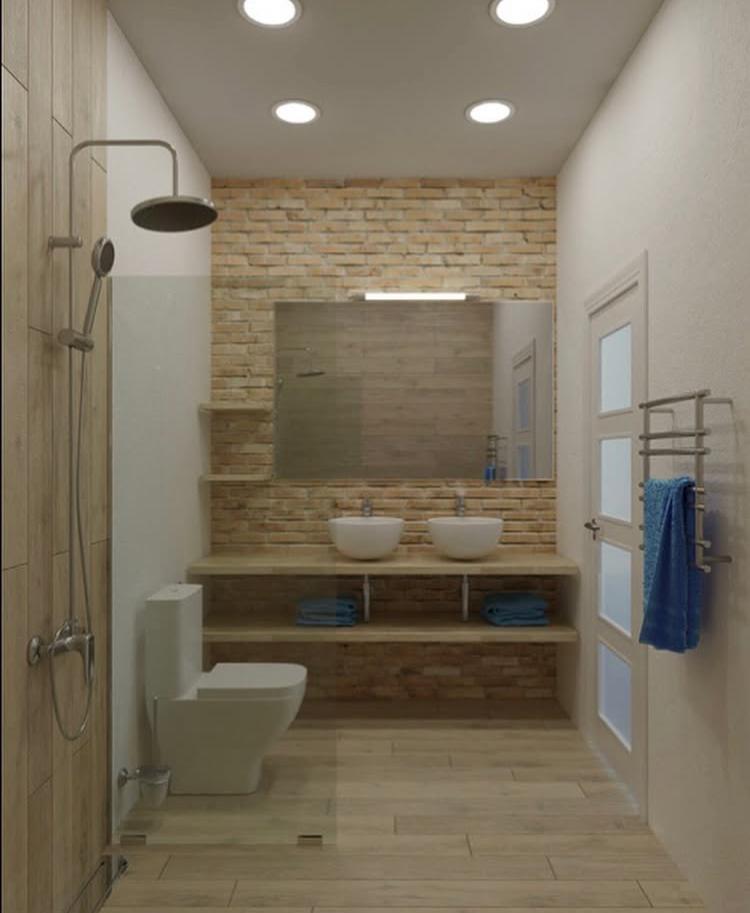 Baño moderno con revestimiento piedra - ConstruFach